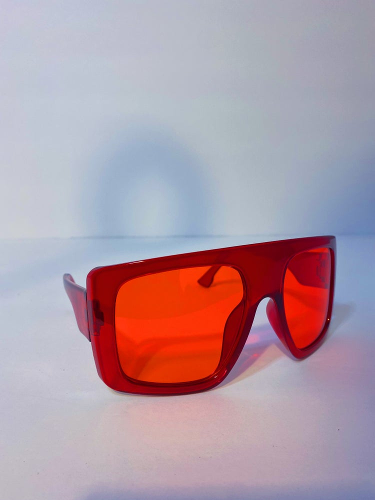 red oversized sunglasses with red lens