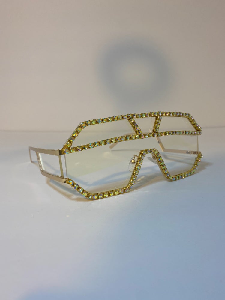 oversized clear and gold sunglasses with gold rhinestone frame and clear lens