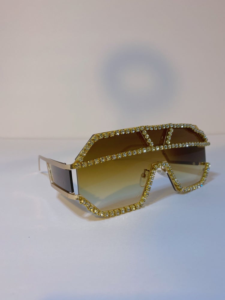 oversized brown and gold sunglasses with gold rhinestone frame and brown lens