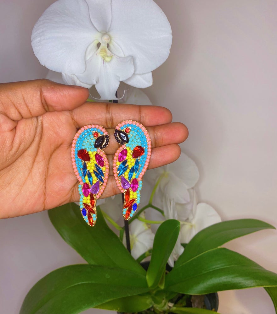 studded blue and peach parrot earrings with red, pink, purple and blue rhinestone accents