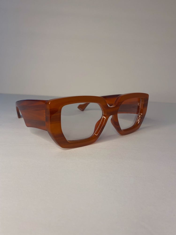 orange frame clear lens glasses