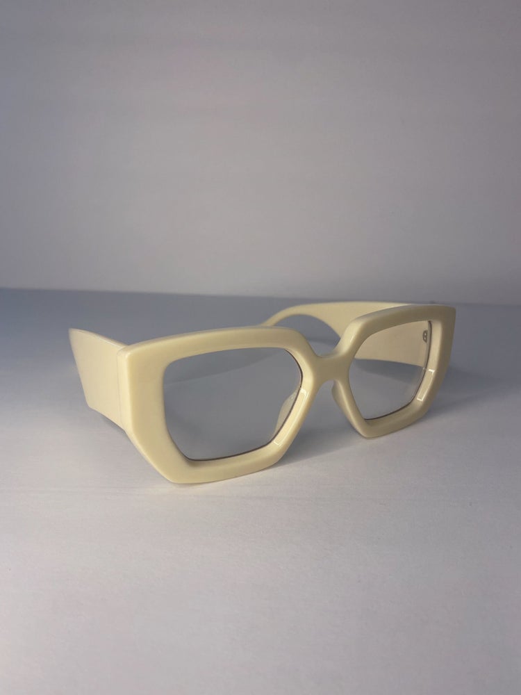 cream frame clear lens glasses