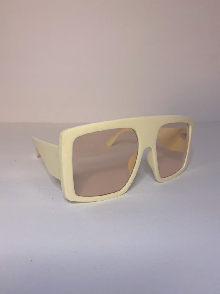 creme oversized sunglasses with creme lens