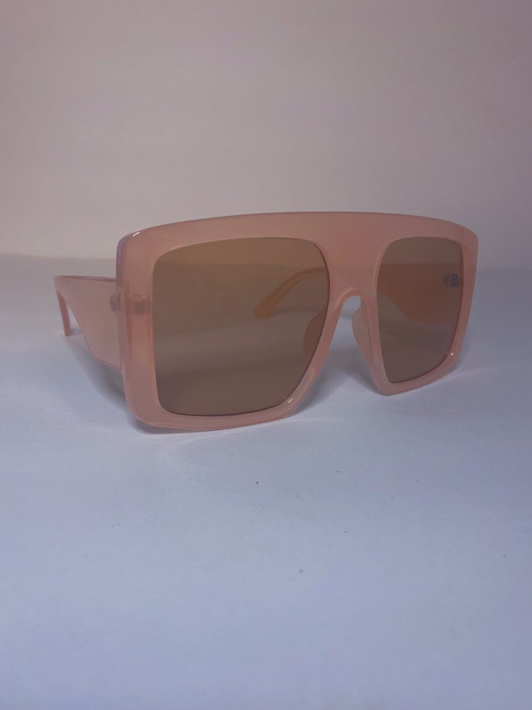 pastel pink oversized sunglasses with pastel pink lens